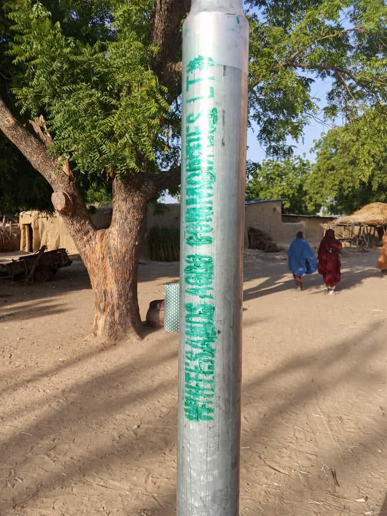 Solar-powered streetlight installed by Whitesands Agro in a farming community